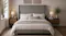Front view of the upholstered headboard in a symmetrical neutral tone bedroom Front view of the upholstered headboard in a symmetrical neutral tone bedroom
